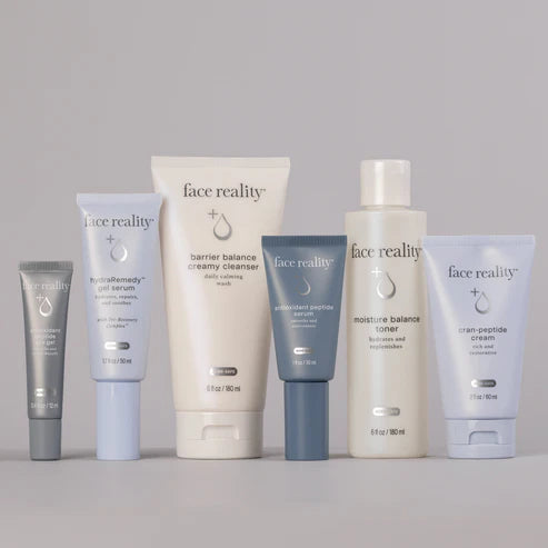 Face Reality Deluxe Age Defense Kit featuring Barrier Balance Creamy Cleanser, Moisture Balance Toner, Antioxidant Peptide Eye Gel, Antioxidant Peptide Serum, HydraRemedy Serum, and Cran-Peptide Cream to hydrate, support collagen, and improve the appearance of fine lines at The Skyn Distillery Wayzata Minnesota.
