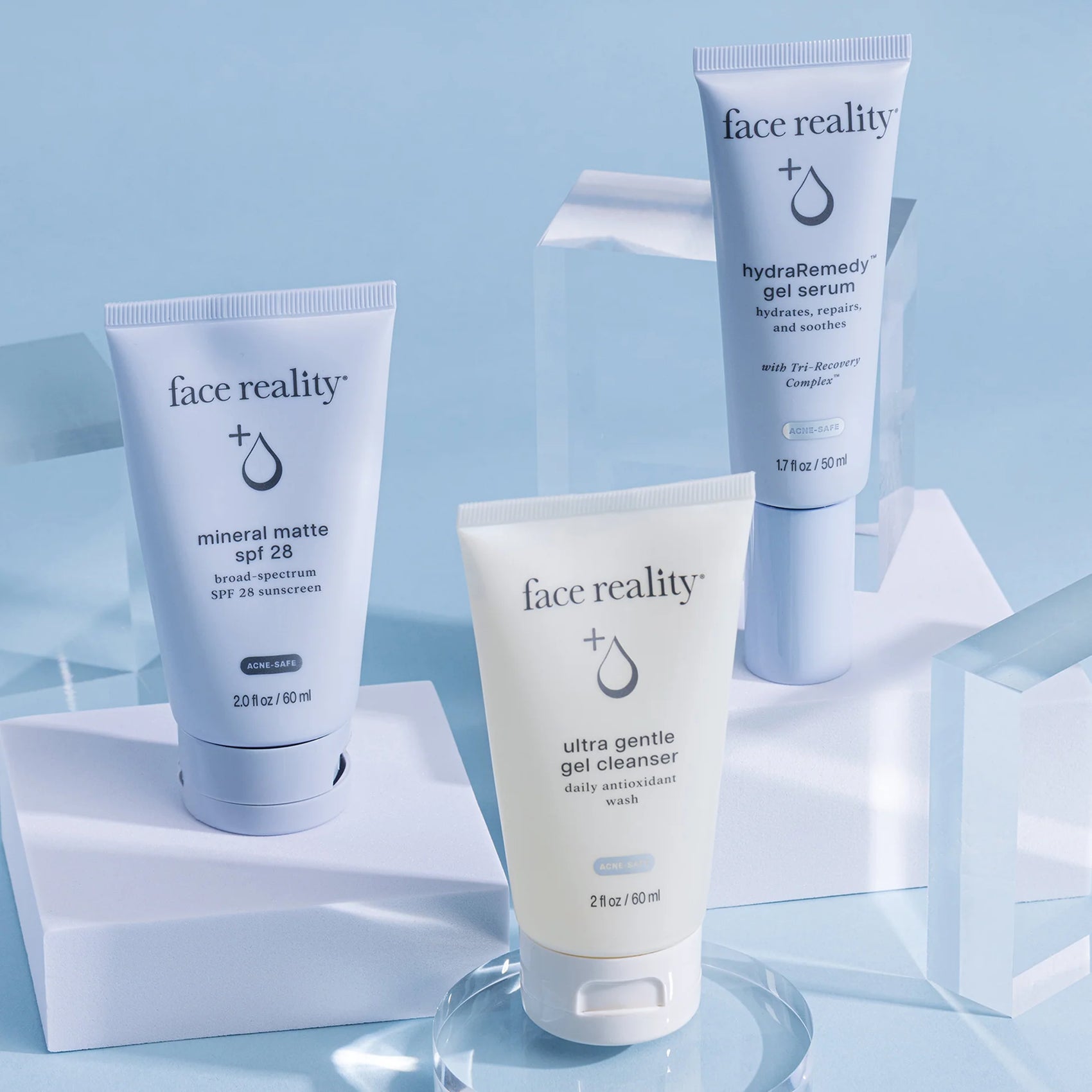 Face Reality Travel Kit for Oily Skin featuring Travel Size Ultra Gentle Cleanser, HydraRemedy Gel Serum, and Mineral Matte SPF 28 to cleanse, hydrate, and protect oily skin with a matte mineral sunscreen while traveling at The Skyn Distillery Wayzata Minnesota.
